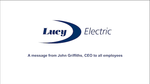 Video Message still from Lucy Electric Lucy Electric Logo on a white Background with writing below
